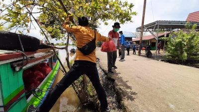 Pelatihan Kader Lanjut II PC PMII Kota Banjarmasin Ditutup Baksos Bantu Korban Banjir 