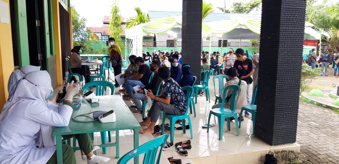 Percepat Penanganan Covid-19, PWNU Kalsel Bersama Polda Menggelar Vaksinasi Massal