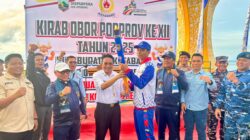Kirab Obor PORPROV XII Hangatkan Siring Laut Kotabaru, Kobarkan Semangat Sportivitas & Persatuan